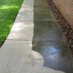 Cleaning a concrete walkway